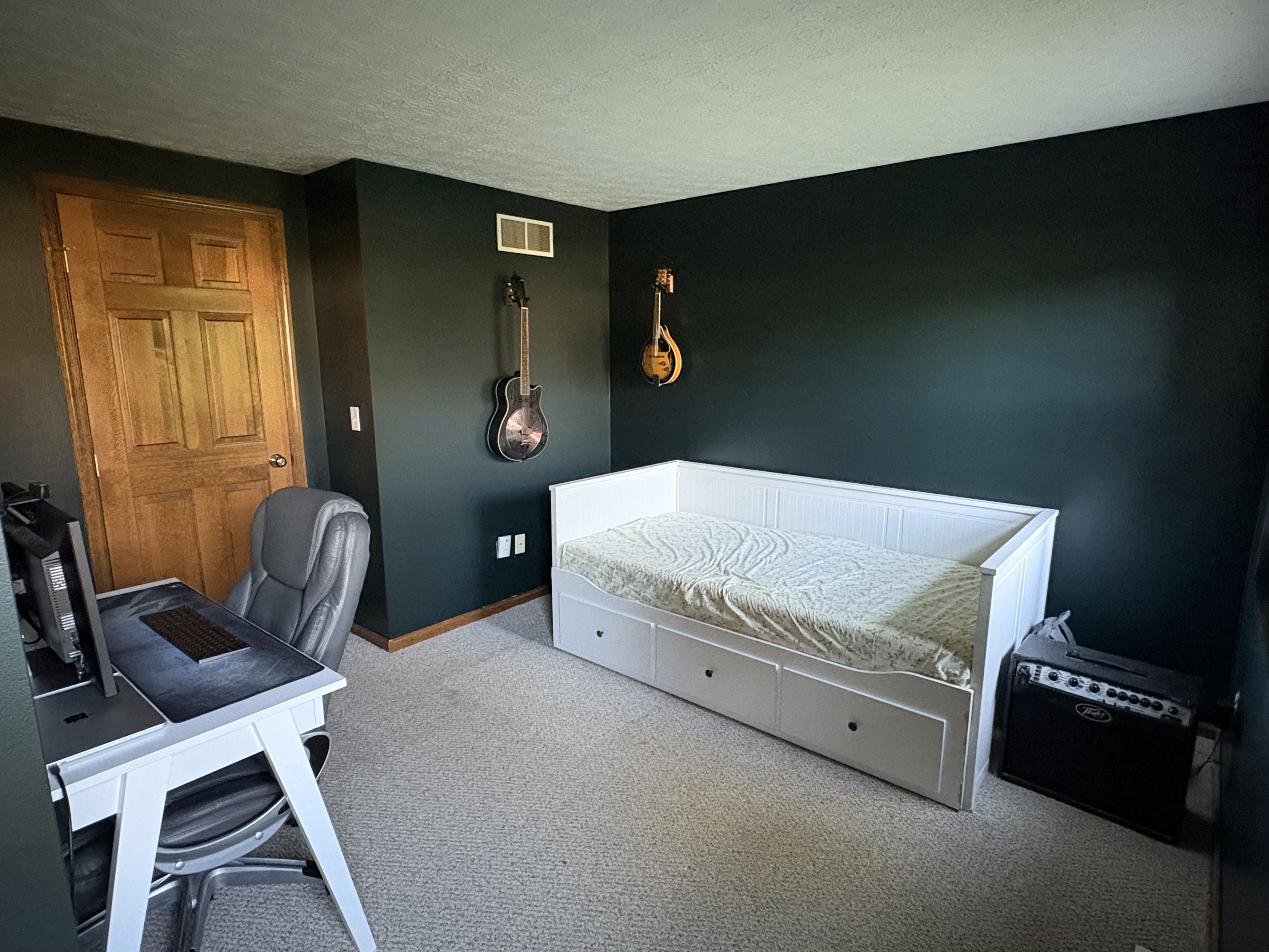 Viewing the bedroom walls facing the entry after interior painting.